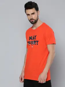 Puma Men Orange & Black Printed dryCELL Performance Slogan Training Sustainable T-shirt