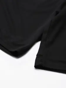 UNDER ARMOUR Men Black Solid Baseline 10" Shorts