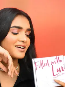 Fida Silver-Toned Dome Shaped Oxidised Jhumkas Earrings