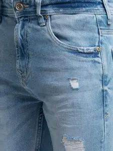 SPYKAR Men Blue Tapered Fit Mildly Distressed Light Fade Jeans