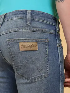 Wrangler Men Skanders Slim Fit Low-Rise Heavy Fade Clean Look Stretchable Jeans