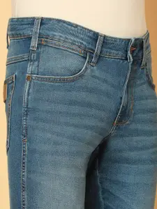 Wrangler Men Skanders Slim Fit Low-Rise Low Distress Light Fade Stretchable Cotton Jeans