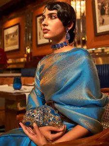 DEVATITHI Ethnic Motifs Woven Design Zari Detailed Kanjeevaram Saree