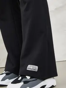 Styli Printed High Neck Drop Shoulder Sleeves T-shirt & Flared Trouser Co-ords