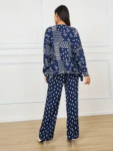 Styli Printed Relaxed Fit Round Neck Top & Flared Trouser Co-Ords