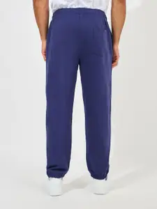 Styli Men Embroidered City Name Relaxed Terry Joggers