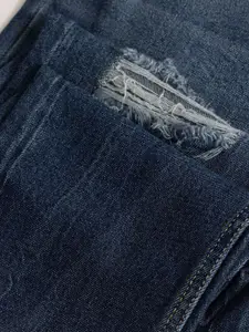 Snitch Men Loose Relaxed Fit Mildly Distressed Cotton Light Fade Stretchable Jeans