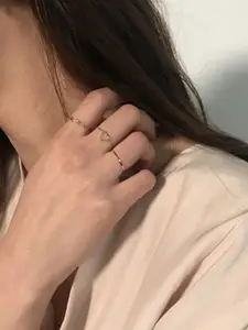 YU FASHIONS Set Of 4 Stainless Steel Gold-Plated Finger Rings