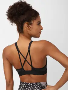 Reebok Studio Hero Medium-Impact Strappy Bra