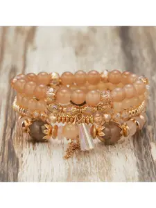 DressBerrySet Of 4 Gold-Plated Crystals Studded & Beaded Tribal Elasticated Bracelet