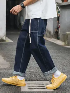 StyleCast x Revolte Men Relaxed Fit Mid-Rise Dark Jeans