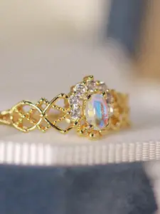 StyleCast Gold-Plated Stone-Studded Round Shaped Adjustable Finger Ring