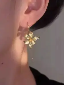 VAGHBHATT Gold-Plated Floral Shaped Textured Drop Earrings