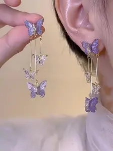 VAGHBHATT Gold-Plated Stones Studded Butterfly Shaped Tasselled Drop Earrings