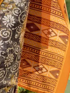 Mitera Woven Design Batik Printed Zari Saree