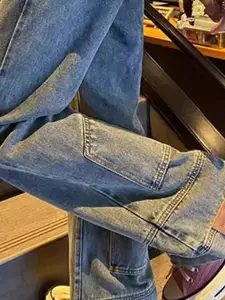 StyleCast x Revolte Men Wide Leg Light Fade Jeans