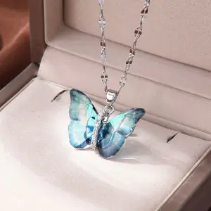DressBerry Silver-Plated Stainless Steel Butterfly Shaped Stone Studded Pendant & Chain