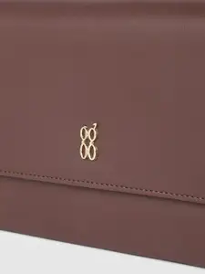 Baggit Women Solid Three Fold Wallet with SIM Card Holder