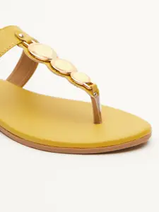 Vishudh Women Mustard Embellished T-Strap Flats