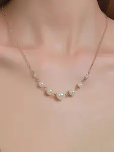 Jewels Galaxy Brass Pearl Studded Gold-Plated Statement Necklace