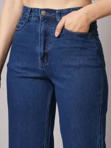 GUTI Women Flared High-Rise Stretchable Light Fade Cotton Jeans