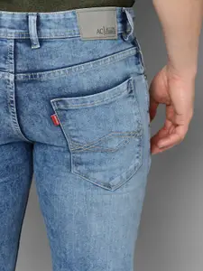 Allen Cooper Men Mid-Rise Heavy Fade Stretchable Jeans