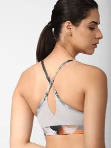 Reebok Abstract Printed Lux Strappy Sports Bra