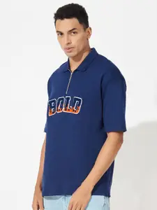 Maniac Typography Printed Polo Collar Oversized T-shirt