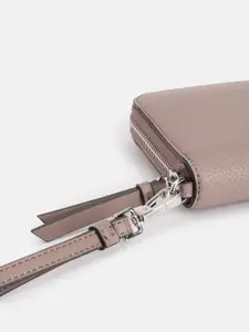 Calvin Klein Women Abstract Textured PU Zip Around Wallet With Sling Strap & Wrist Loop