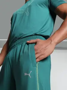 one8 x PUMA Men Solid Slim Fit Mid-Rise Regular Track Pants