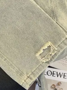 StyleCast x Revolte Men Relaxed Fit Mildly Distressed Light Fade Jeans