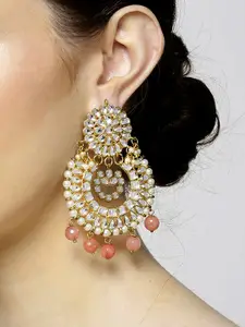 KARATCART Peach-Coloured & Off-White Gold-Plated Stone-Studded Crescent Shaped Chandbalis