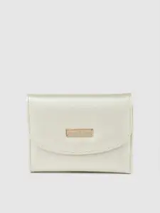 Caprese Women Off-White Solid NELLY Three Fold Wallet