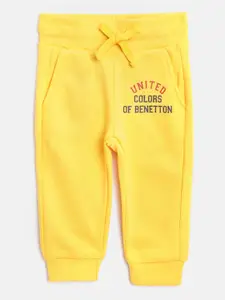 United Colors of Benetton Boys Yellow Solid Joggers with Printed Detail