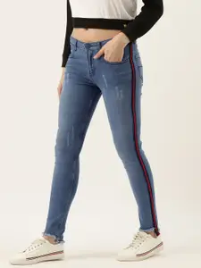 Campus Sutra Women Blue Cotton Slim Fit Mid-Rise Mildly Distressed Jeans with Side Stripe