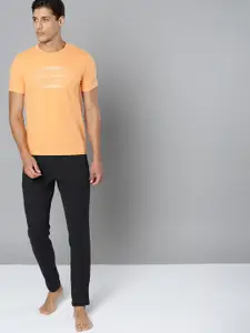 HRX By Hrithik Roshan Yoga Men Orange Melange Typography  Sustainable Tshirt