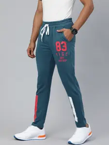 The Indian Garage Co Men Teal Blue Solid Regular Fit Track Pants with Print Detail
