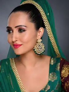 Sukkhi White Gold-Plated Kundan Studded Handcrafted Crescent Shaped Chandbalis