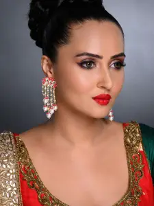 Sukkhi Pink Gold-Plated Kundan Studded Tasselled Contemporary Drop Earrings