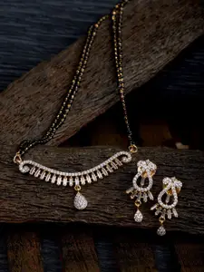 Saraf RS Jewellery Gold-Plated Black Beaded & White AD Stone-Studded Mangalsutra With Earrings