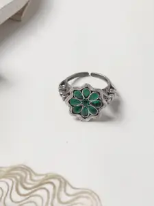 TEEJH Silver-Plated & Green Stone-Studded Flower Shaped Oxidised Adjustable Finger Ring