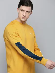 one8 x PUMA Men Mustard Yellow Solid Pullover Sweatshirt With Contrast Detail