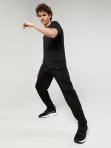 Puma Men Black Solid Tapered Woven Track Pants