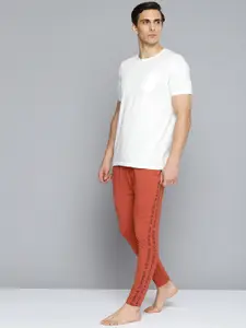 HRX By Hrithik Roshan Yoga Men Tandoori Spice Rapid-Dry Solid Sustainable Track Pants