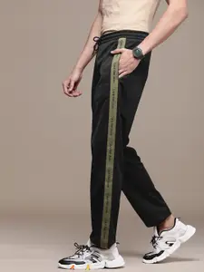 Calvin Klein Jeans Men Black Solid Side Logo Taped Track Pant