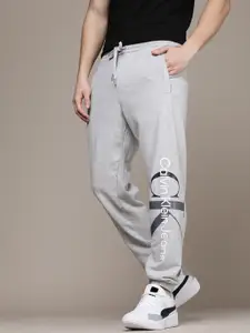 Calvin Klein Jeans Men Grey Brand Logo Printed Pure Cotton Joggers