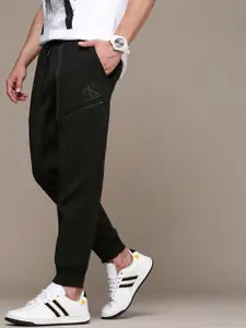 Calvin Klein Jeans Men Black Solid Mid-Rise Joggers with Brand Logo Applique Detail