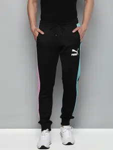Puma Pume Men Black Brand Logo Printed Regular Fit Mid Rise Sustainable Joggers With Constrast Side Stripes
