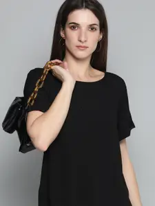 Levis Women Black Solid Regular Sleeved Casual Top