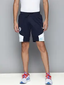Puma Men Navy Blue And White Colourblocked Mid-Rise Football Shorts